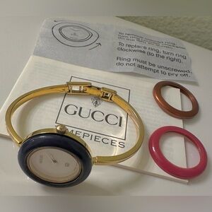 Gucci Gold Bangle Watch with Interchangeable Black, Red, and Brown/Chrome Bezels